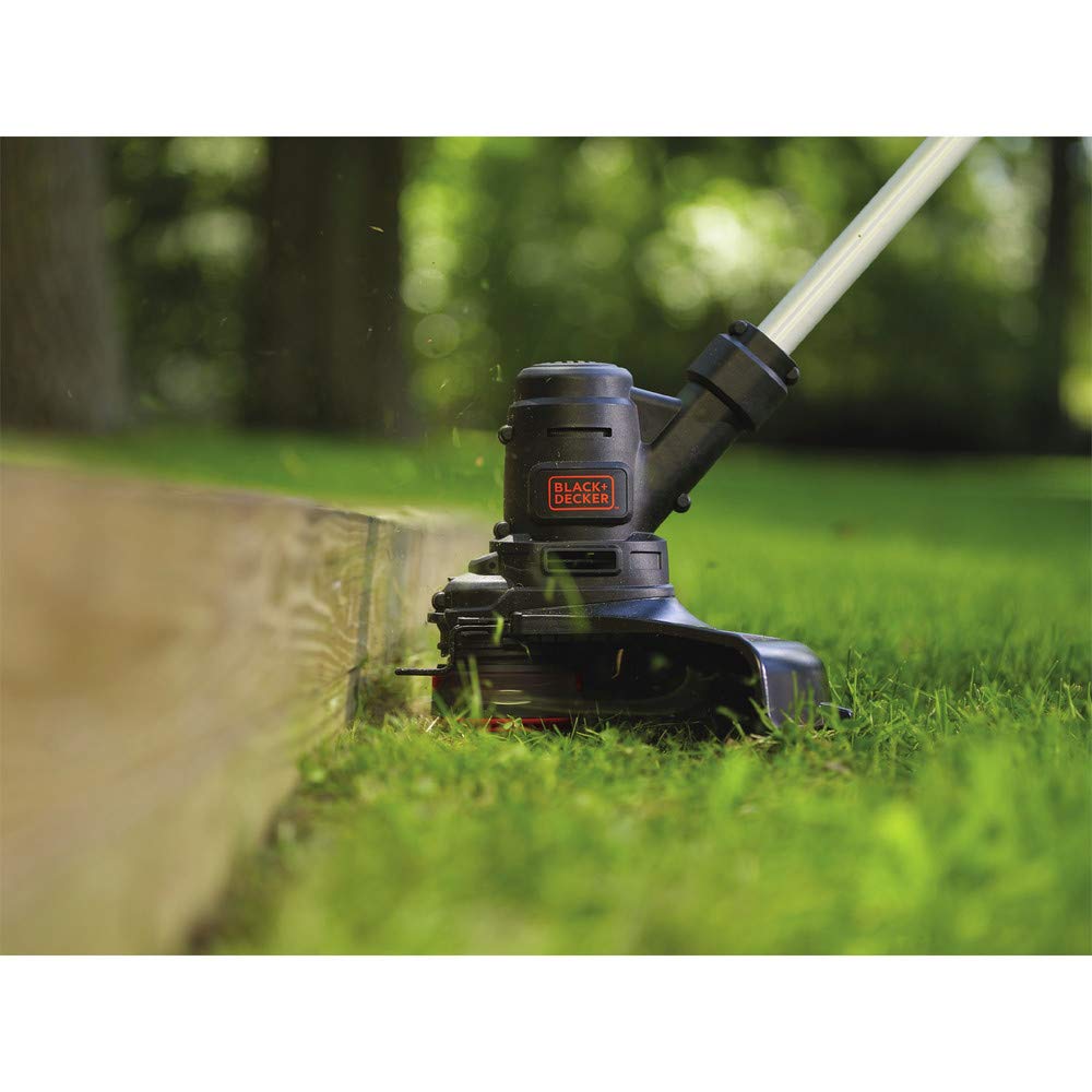 BLACK+DECKER trimming a sidewalk edge to produce crisp lines and neat curbs