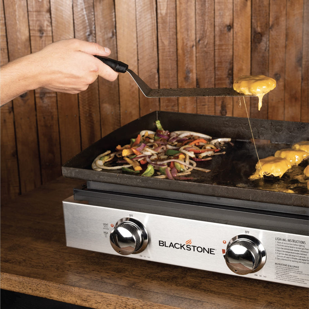 Blackstone rear grease trap detail illustrating cleaner, easier cleanup