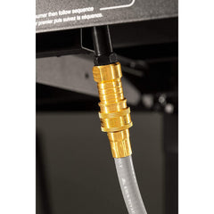 Blackstone hose connected to a natural gas line demonstrating stable fuel supply