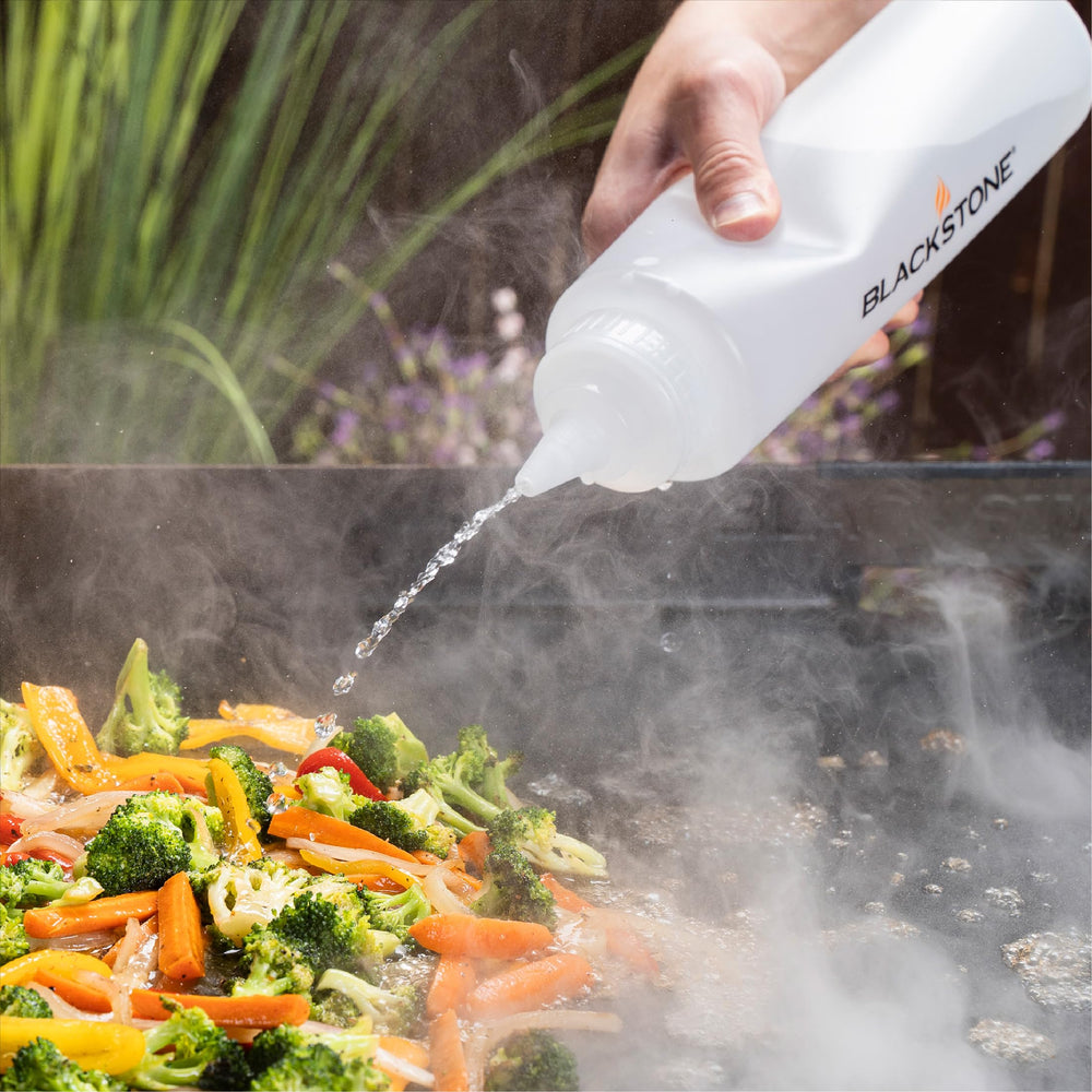 Blackstone tools in use cooking burgers showing efficient outdoor cooking