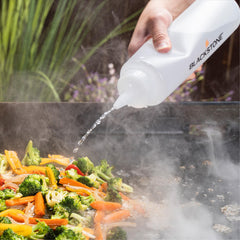 Blackstone tools in use cooking burgers showing efficient outdoor cooking