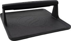 BLACKSTONE griddle press front view showing rubber handle for safe, confident grip
