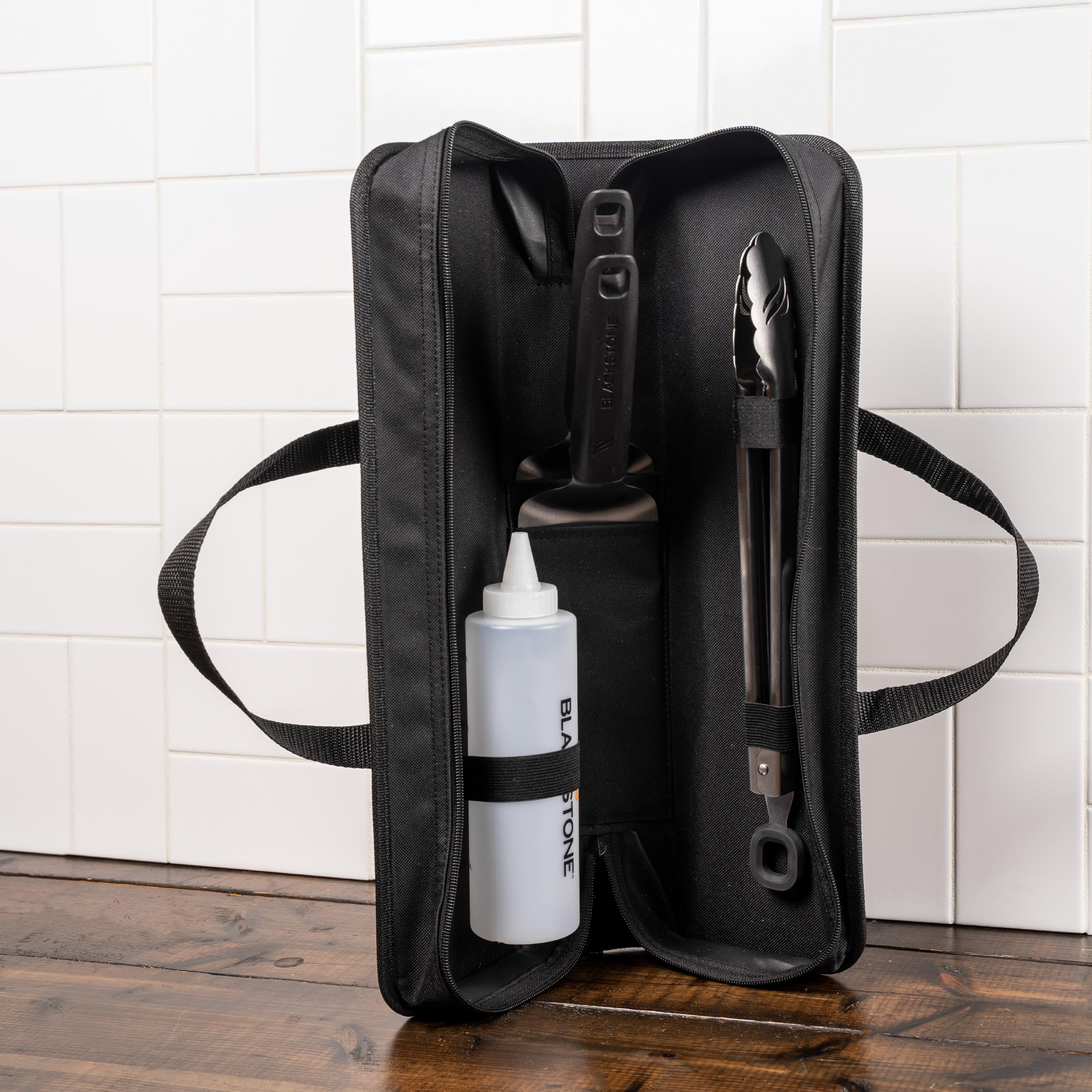 BLACKSTONE set next to common items to show compact size and convenient portability