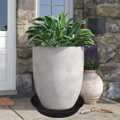 Bleuhome under a large planter catching water to protect floors