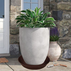 Bleuhome saucer under large planter demonstrating water catchment and neat look