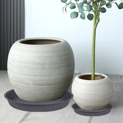 Bleuhome saucer top view with 12" pot demonstrating fit and drainage