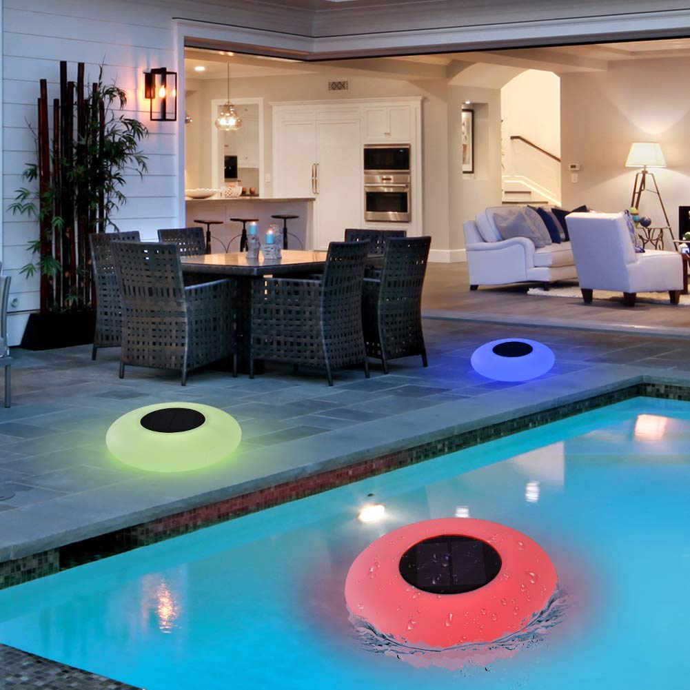 Blibly floating in pool at dusk showing multi-color ambiance for outdoor gatherings benefit