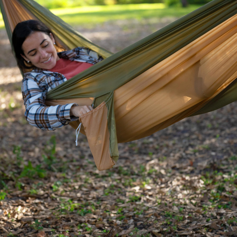 Bliss Hammocks with person relaxing to show roomy comfort and support