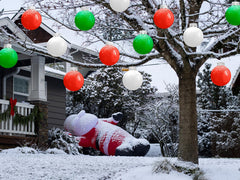 BlissfulTie clustered ornaments on a porch creating an eye-catching seasonal entrance