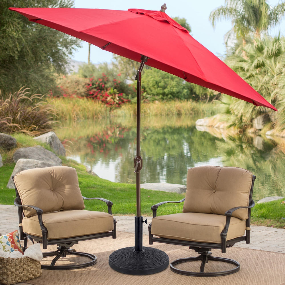 Blissun umbrella base in patio scene showing stable shade for outdoor dining