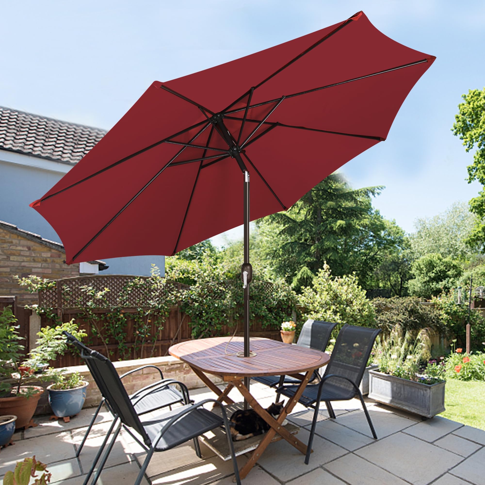 Blissun umbrella in backyard lifestyle setting showing comfortable outdoor shade