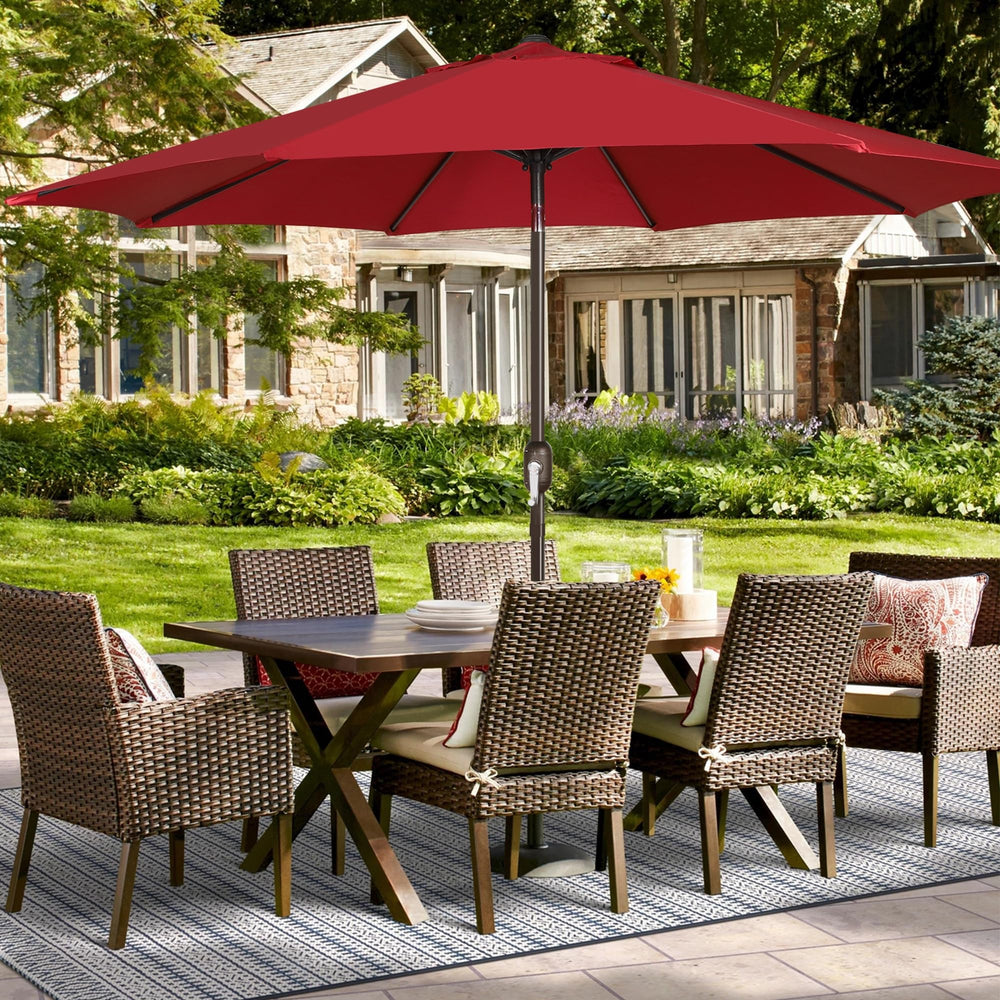 Blissun canopy installed over patio table creating shaded outdoor dining