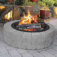 Blue Sky Outdoor Living logs and embers inside ring showing efficient containment and heat