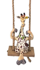 Blue Sky Clayworks giraffe styled on shelf with plants showing visual interest