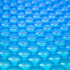 Blue Wave front view of 24-ft round solar cover showing full fit and benefit of heat retention