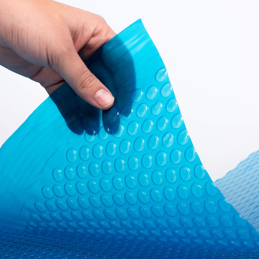 Blue Wave cover next to deck showing true size and scale