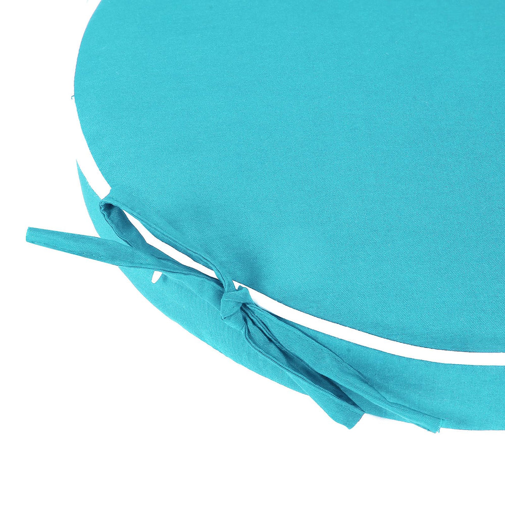 Blytieor cushions on balcony dining table showing stylish outdoor seating upgrade