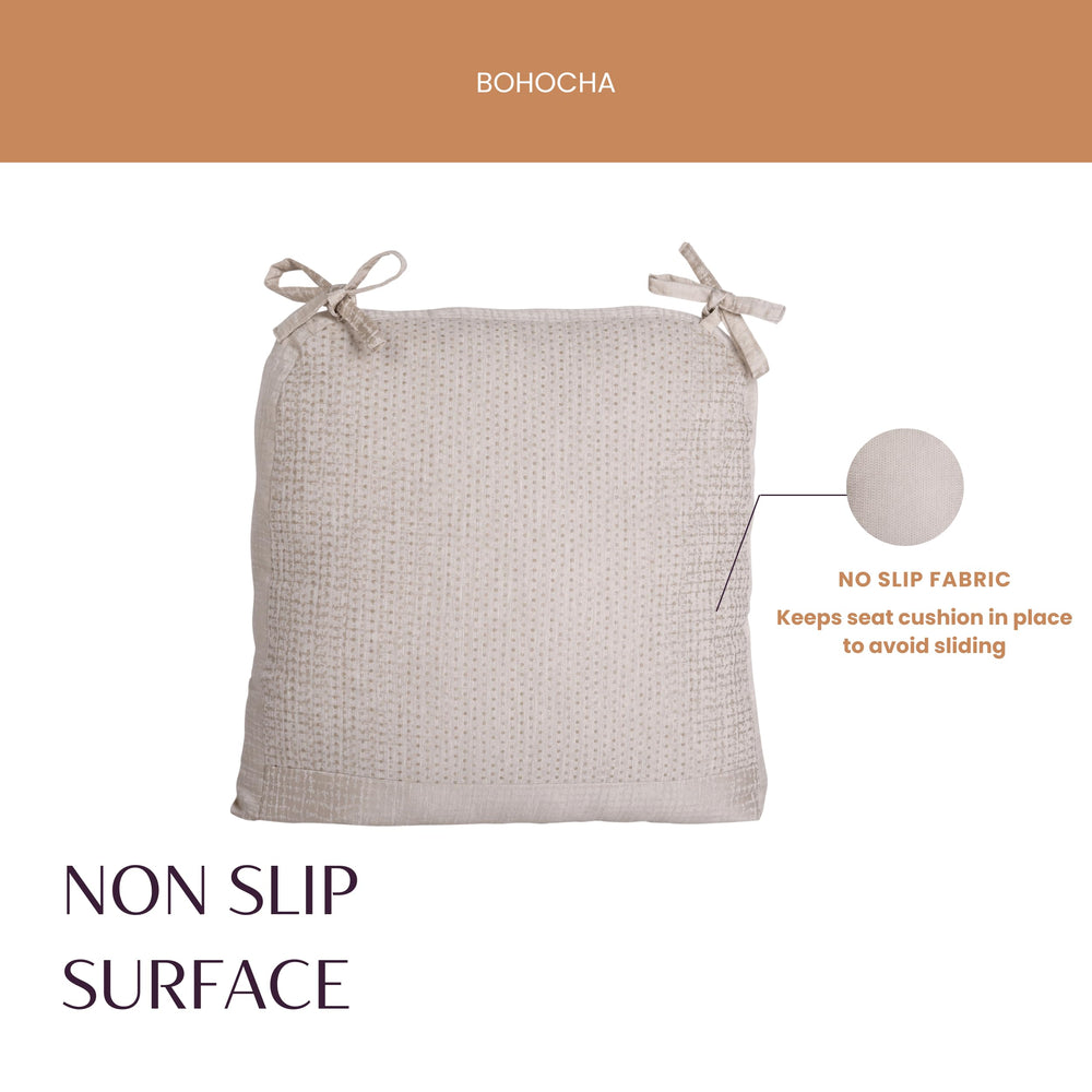 BOHOCHA cushion beside hand for scale showing generous large sizing