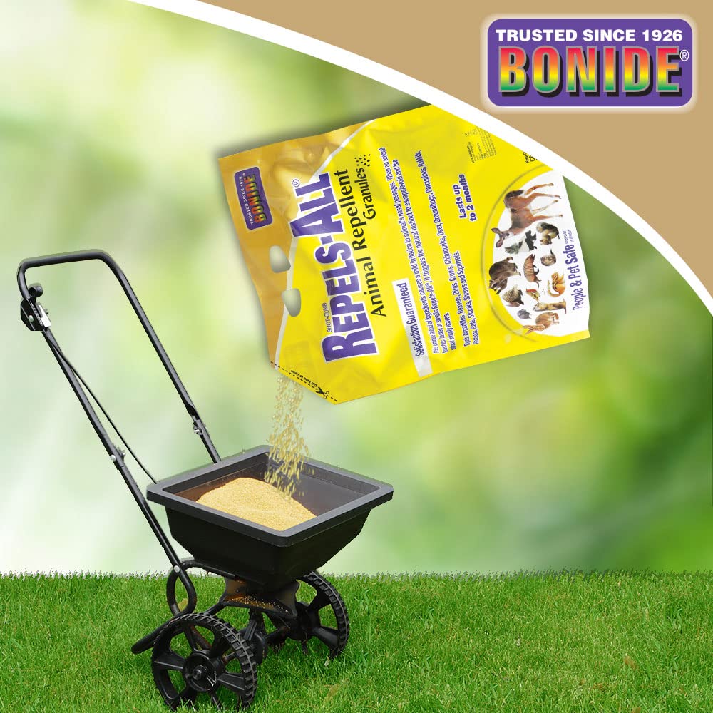 Bonide Repels-All in hand to show 6 lb shaker size and portability