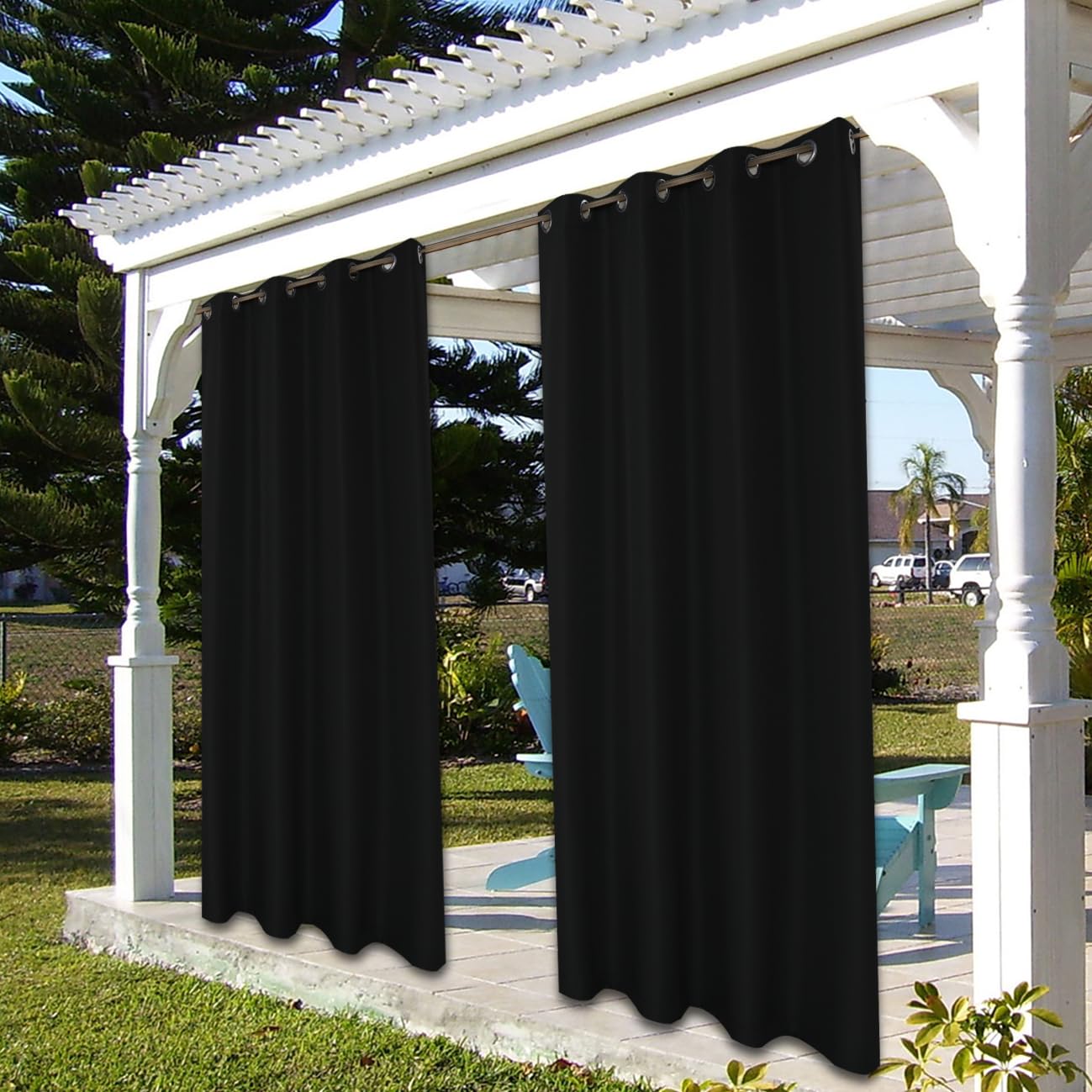 BONZER curtain beside chair showing 54 by 108 inch scale and coverage