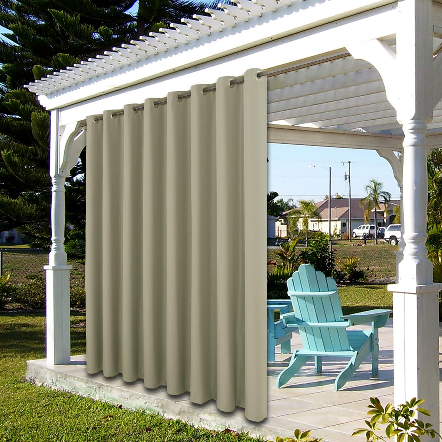 BONZER curtain beside chair to show scale and coverage for large openings