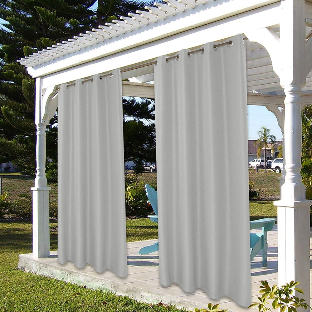 BONZER curtain beside chair showing scale and coverage on patio