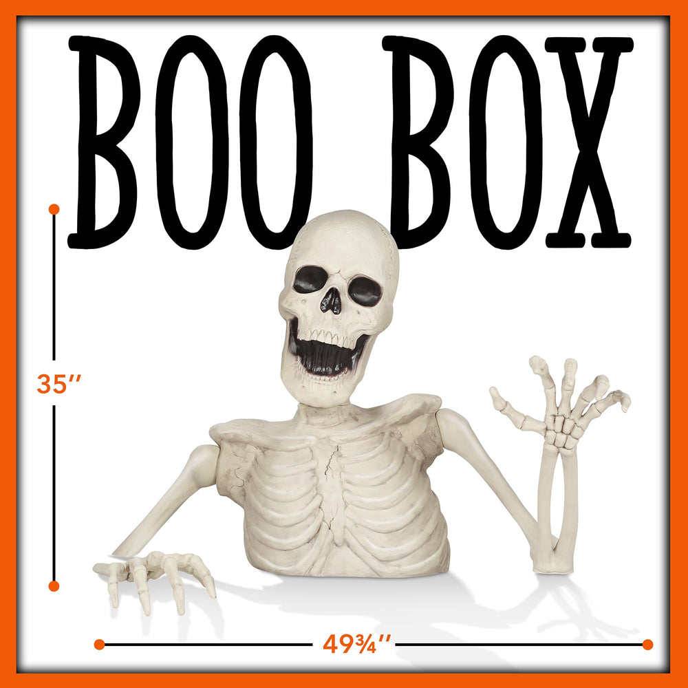BOO BOX nighttime silhouette lit from below creating eerie shadow depth and impact
