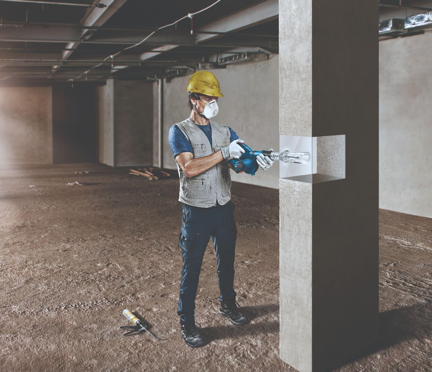 Bosch GBL18V-71N in use clearing leaves on a jobsite for efficiency