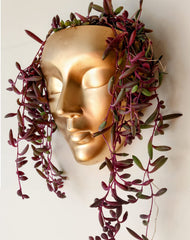 Bossa Linda face planter front view showing gold finish and sculptural appeal