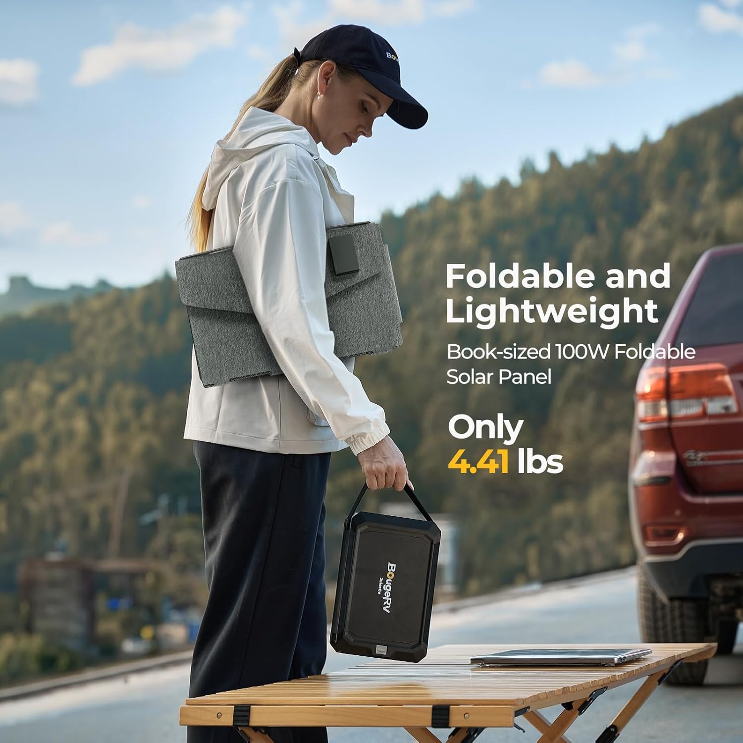 BougeRV panel mounted on tent showing hands-free outdoor charging benefit
