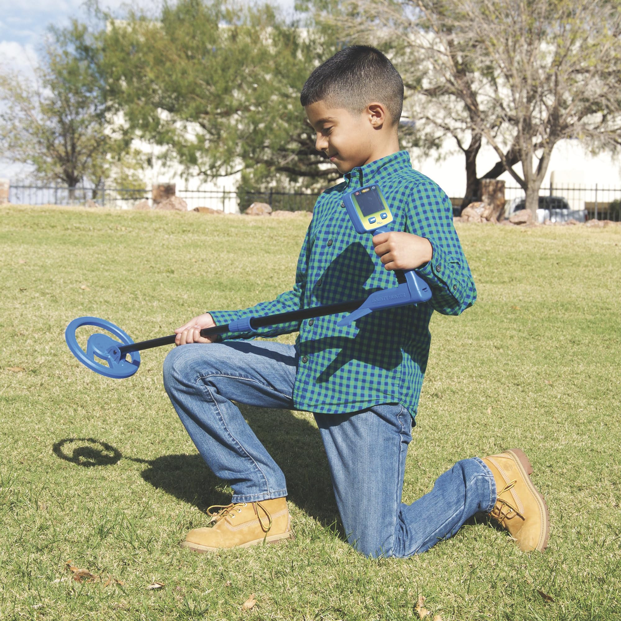 Bounty Hunter used by child on lawn showing outdoor discovery and engagement