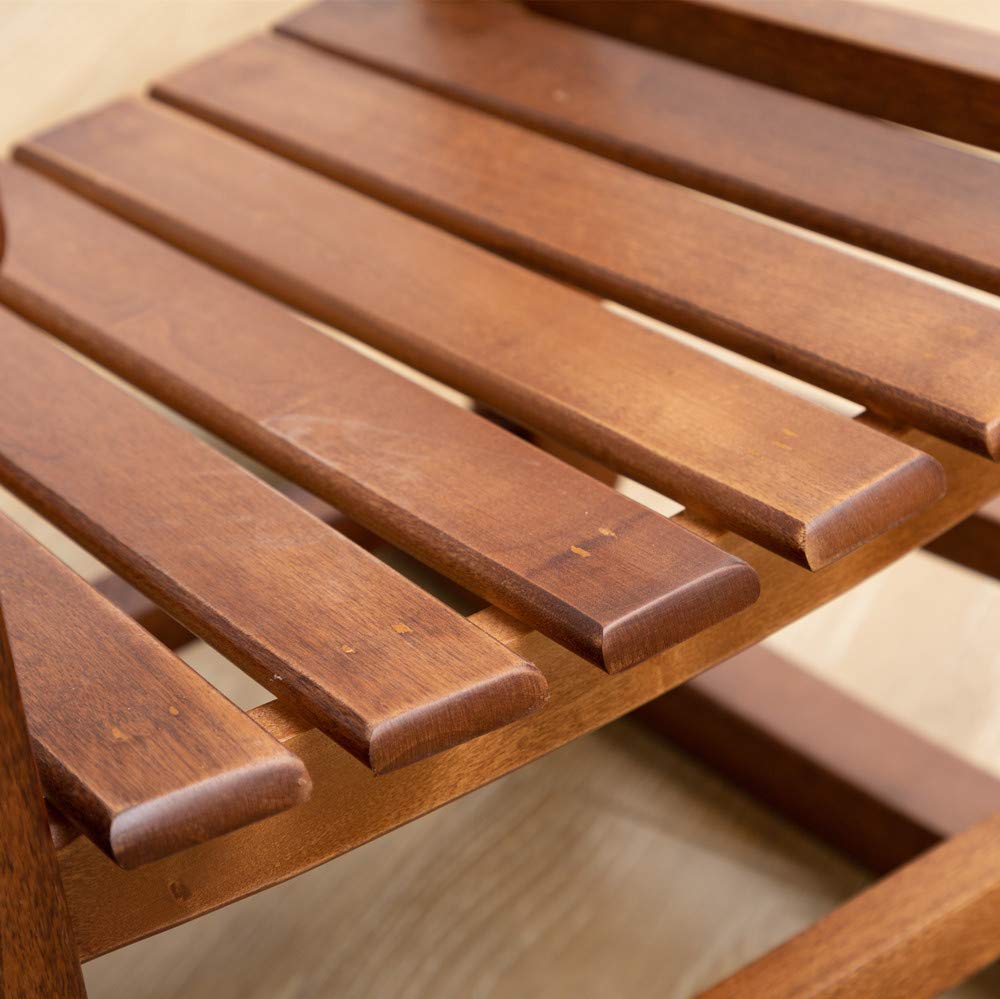 BplusZ rocker on porch in lifestyle scene offering cozy outdoor reading spot