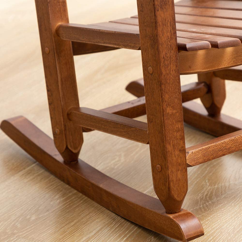 BplusZ chair next to child illustrating size and safe seating proportions