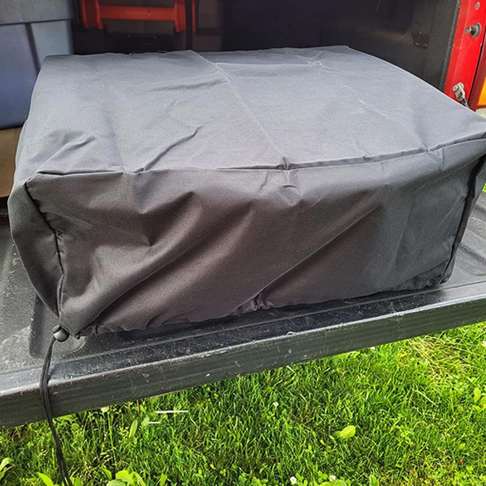 BQMAX in backyard grill station illustrating all-weather protection and ready-to-cook convenience