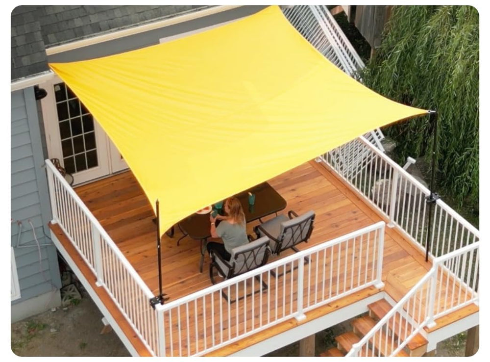 BRANDREW INNOVATIONS Rail-EZ installed on a wooden deck railing providing secure umbrella support