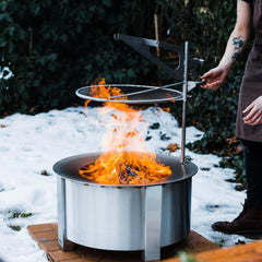 Breeo Outpost Grill 24 locked into Breeo X Series fire pit for secure cooking
