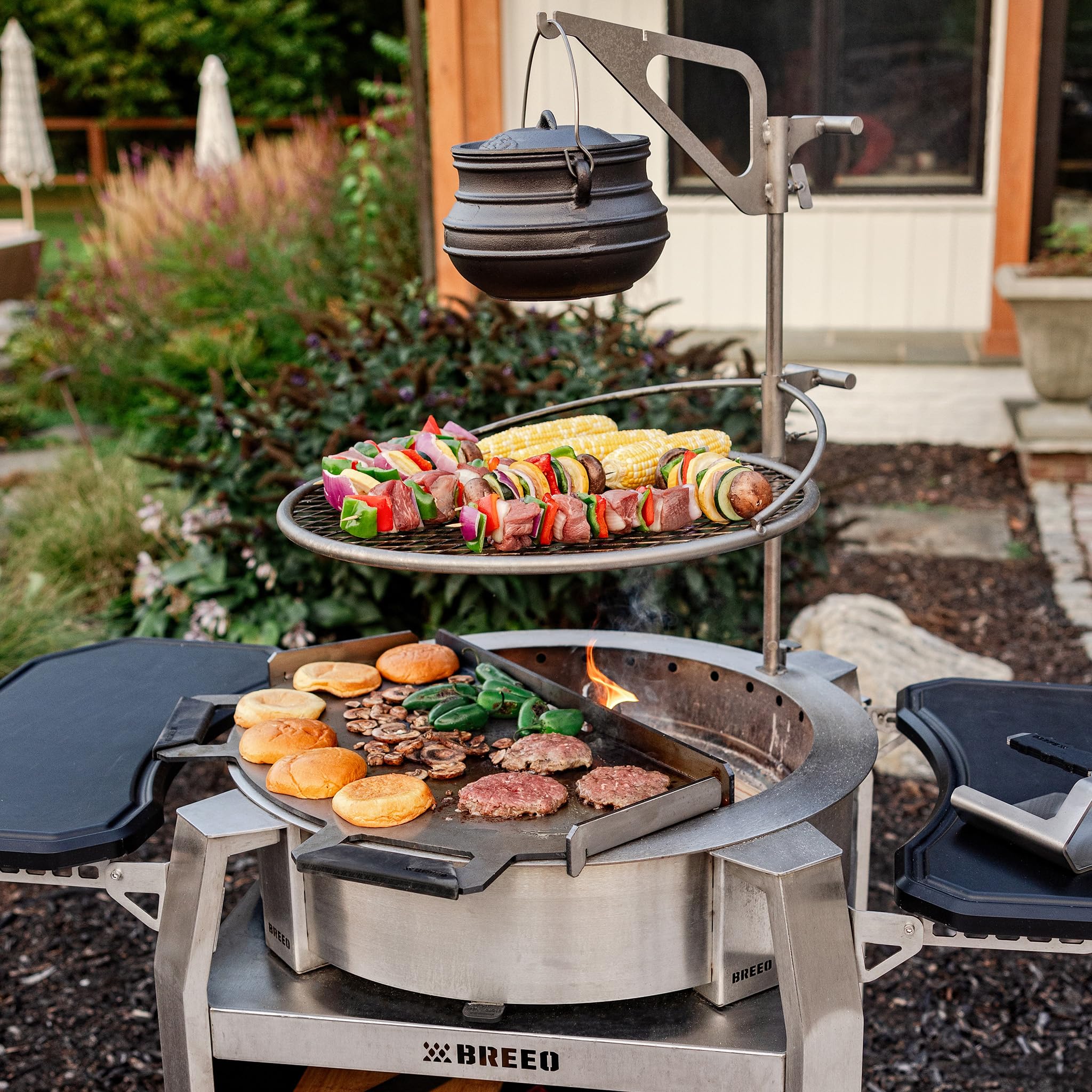 Breeo Outpost Grill 24 with cast-iron pan showing size and load capacity