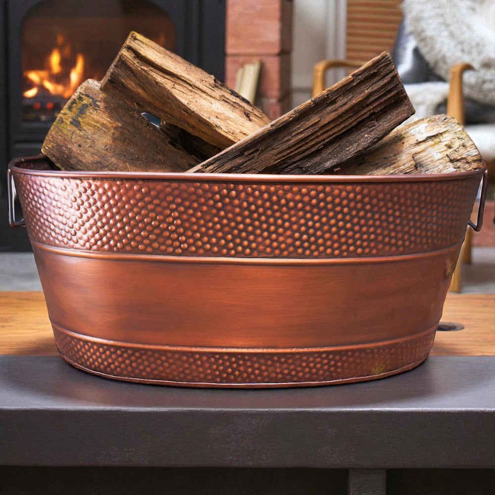 BREKX tub used for blankets showing multipurpose organized storage benefit