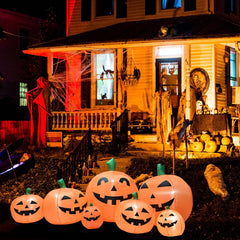 BREONLY LED lights glowing inside larger pumpkins for nighttime impact