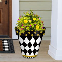 Briarwood Lane planter in use on patio with lush plants showing portability and style benefit