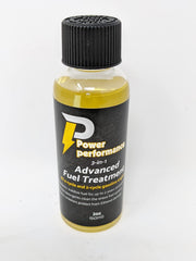 Briggs & Stratton 2 oz fuel treatment bottle held in hand, shows compact storage and convenience