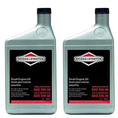 Briggs & Stratton oil bottles next to lawn mower during maintenance for correct oil use