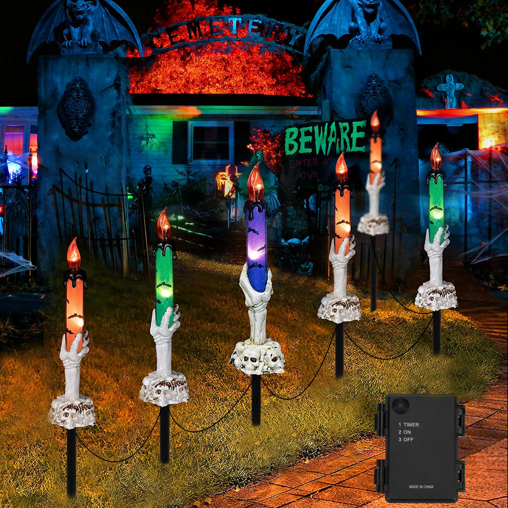 Brightown front view of six skeleton hand candle stakes showing spooky decor benefit
