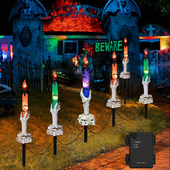 Brightown front view of six skeleton hand candle stakes showing spooky decor benefit