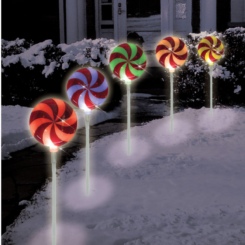 brite star nighttime garden display with color-changing lights enhancing curb appeal