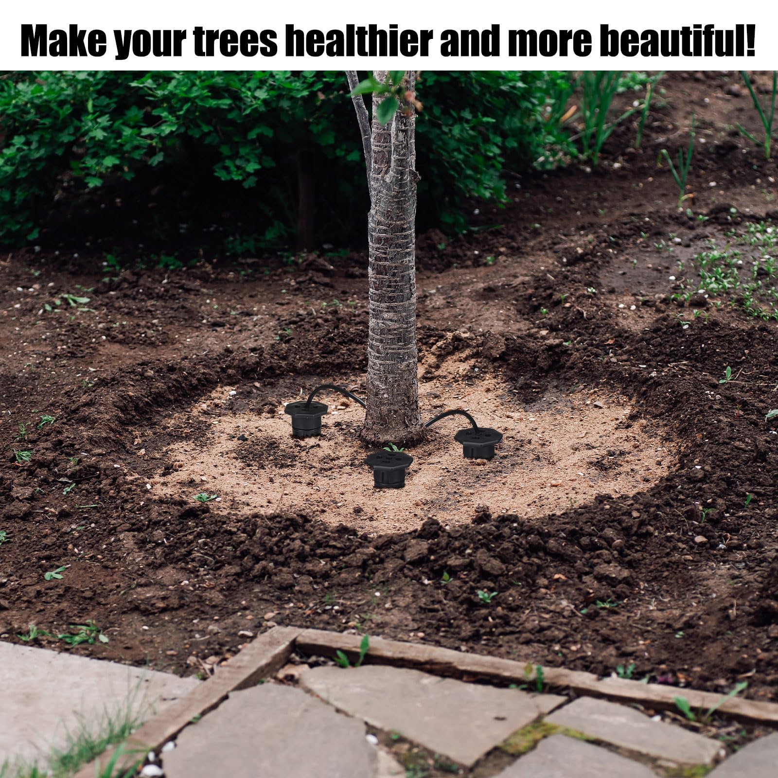 Briwooody stakes in garden among shrubs showing time-saving watering benefit