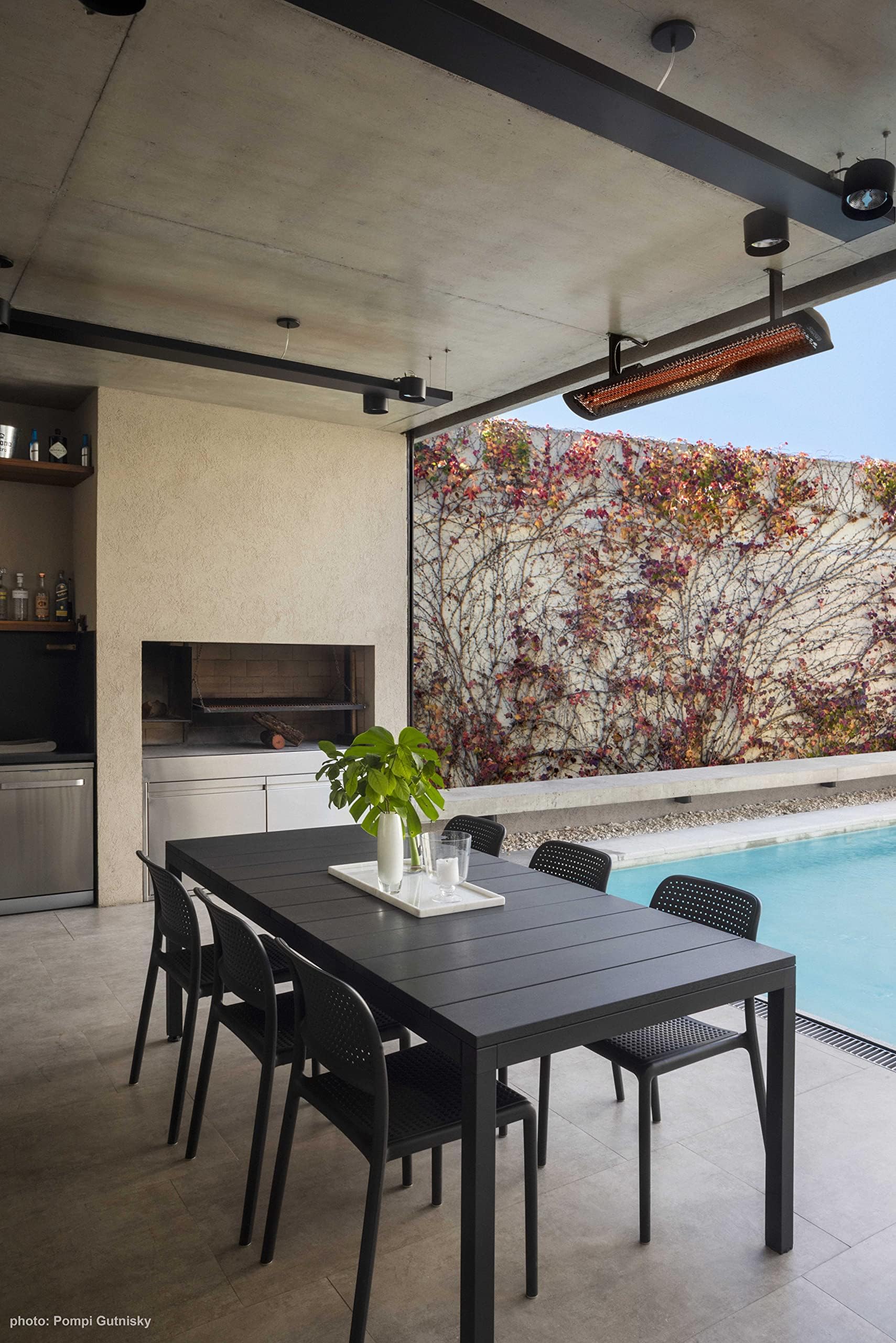 Bromic Heating in-use on a patio at night illustrating comfortable, low-glare outdoor warmth