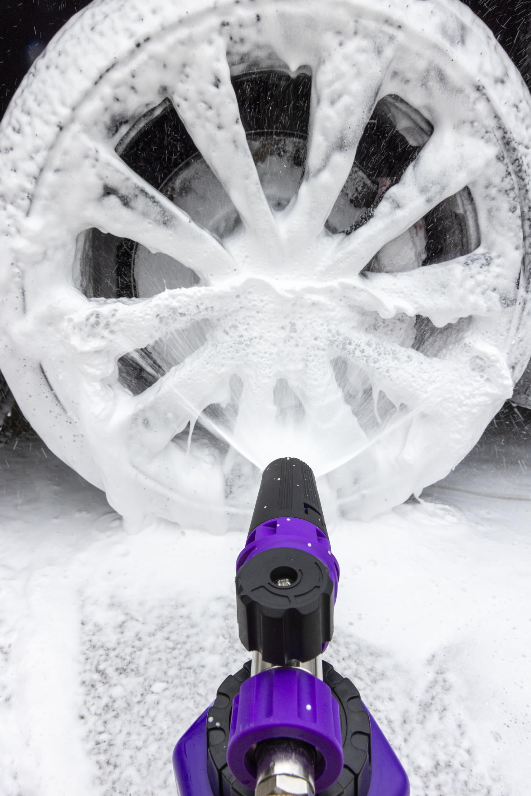 Brug's foam cannon next to pressure washer wand showing compact size and compatibility