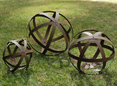 BSTGIFTS front view of three metal garden spheres showing rustic visual appeal and sculptural form