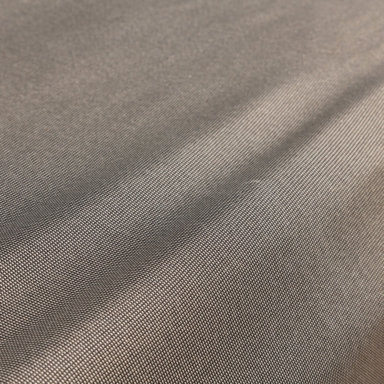 Budge label and dark gray piping detail highlighting reinforced seams